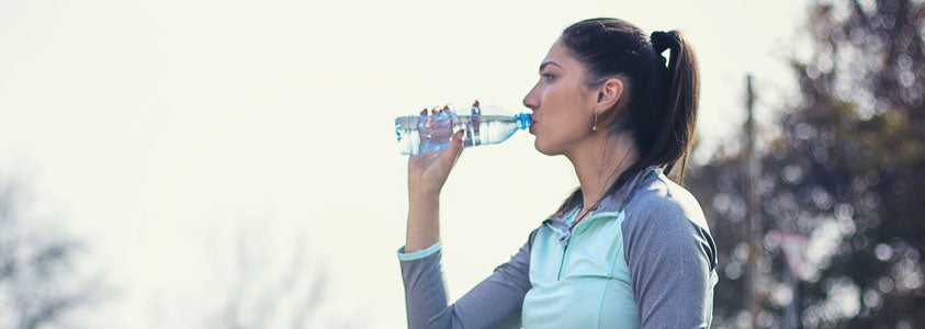 Girl Drinking from a Water Bottle