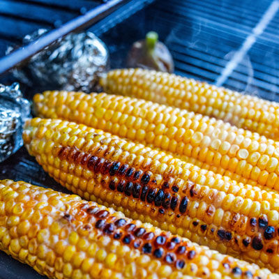 Healthy Corn Recipe Cooking on a Barbecue Grill