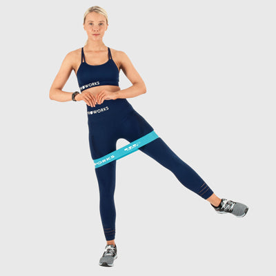 Girl Exercising with Proworks Resistance Bands