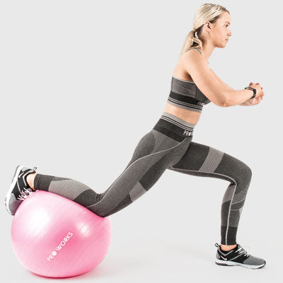 Girl Performing a Reverse Lunge on a Proworks Exercise Ball