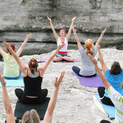 A Group of Women Performing Yoga and Meditating on a Hen Party