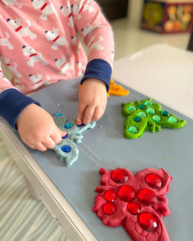 Colour-matching activity with Grimm's gems and playdough.