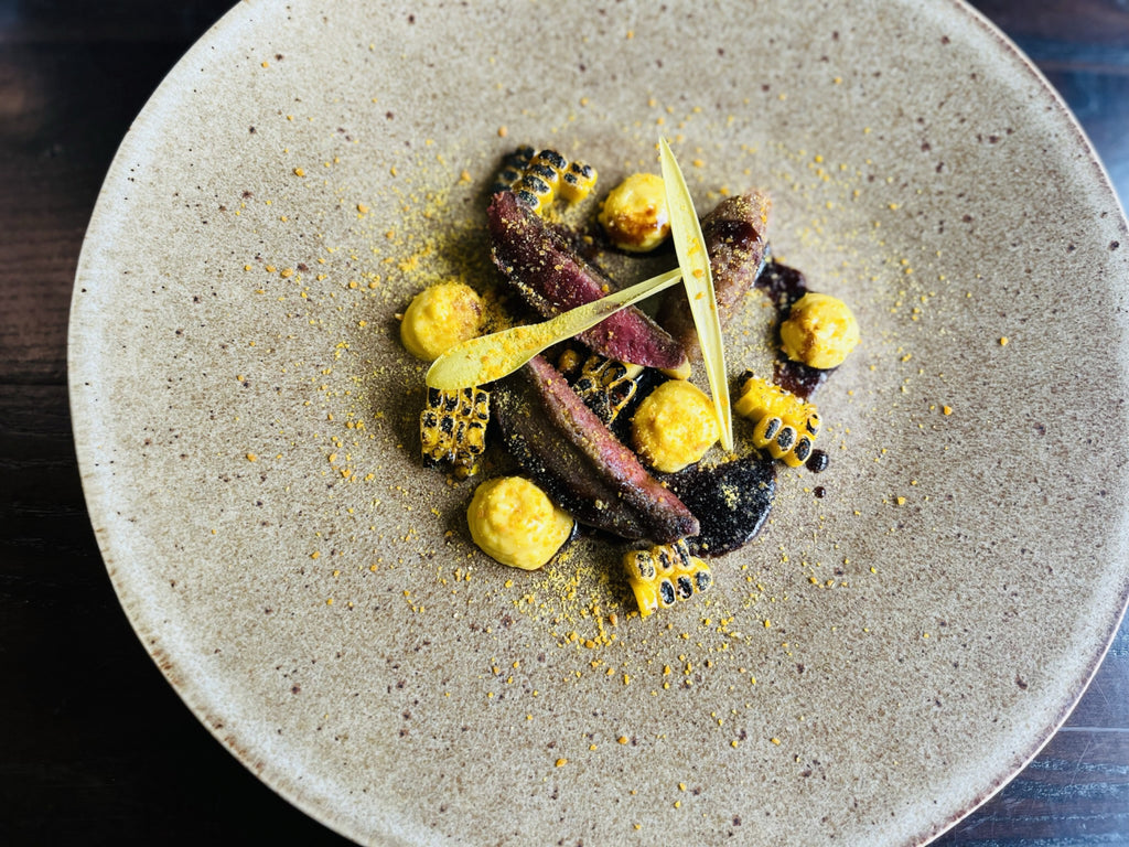 wood pigeon braised corn and bacon jam