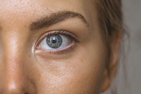 Close up of a face with blue eyes