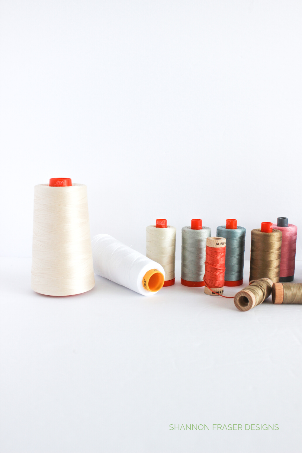 Aurifil Thread spools including a cone in Light Sand | Shannon Fraser Designs Aurifil Artisan #threadcollection
