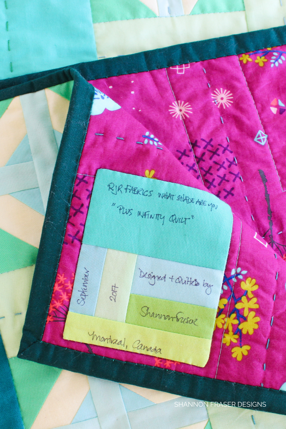 Custom modern improv quilt label handmade by Shannon Fraser Designs for the Plus Infinity Quilt | Quilt tutorial + free pattern by Shannon Fraser Designs #quiltlabel #modernquilt #quiltutorial