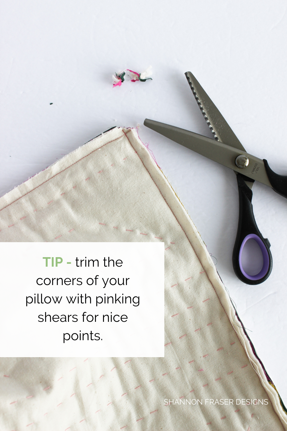 Shattered Star lumbar pillow with the corners trimmed using pinking shears to reduce bulk for nice corners | Sewing tutorial: How to insert a metal zipper | Shannon Fraser Designs #howtosew