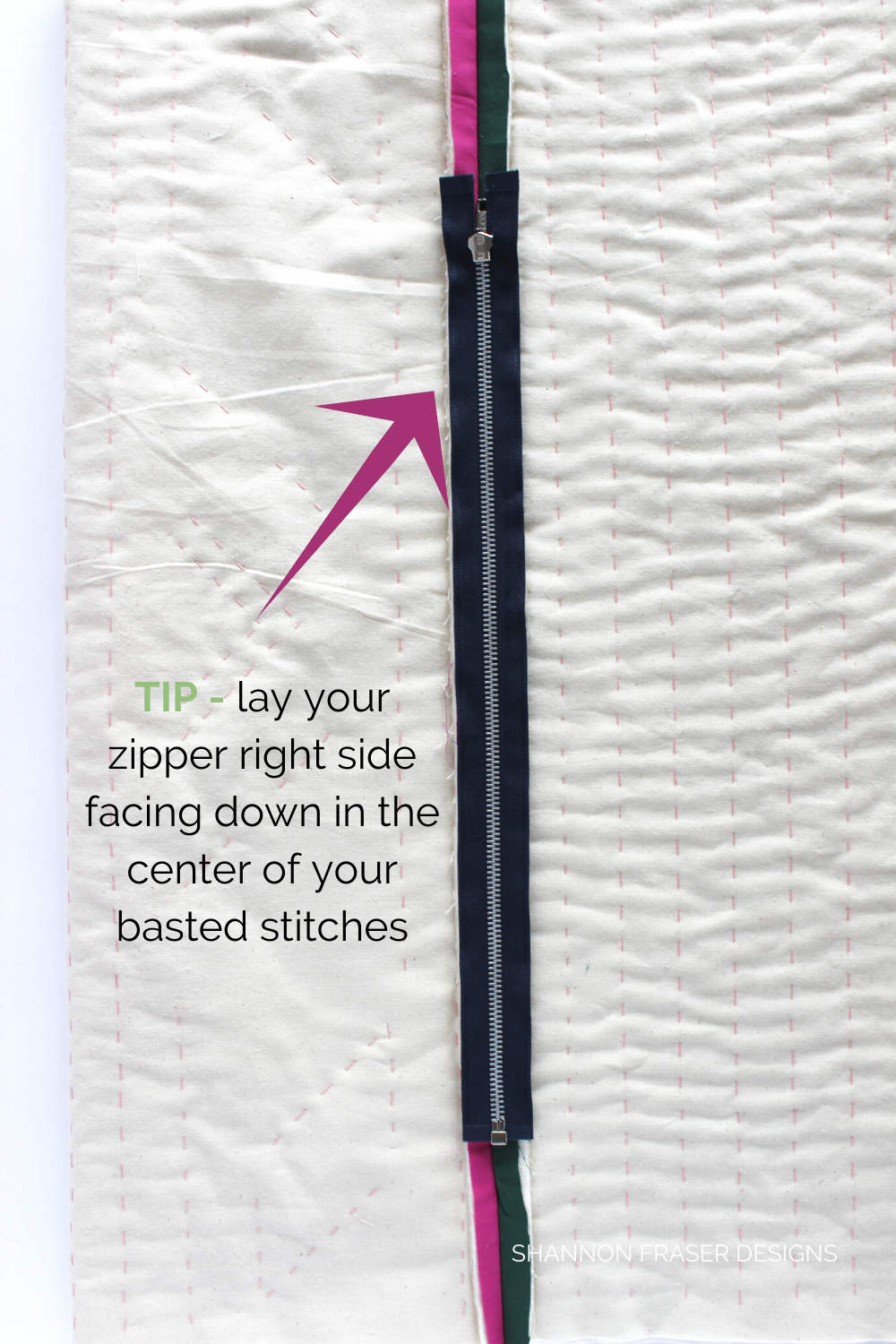 Sewing tip: lay your metal zipper right side facing down in the center of your basted stitches | Sewing tutorial | Shannon Fraser Designs #diycushion #metalzipper