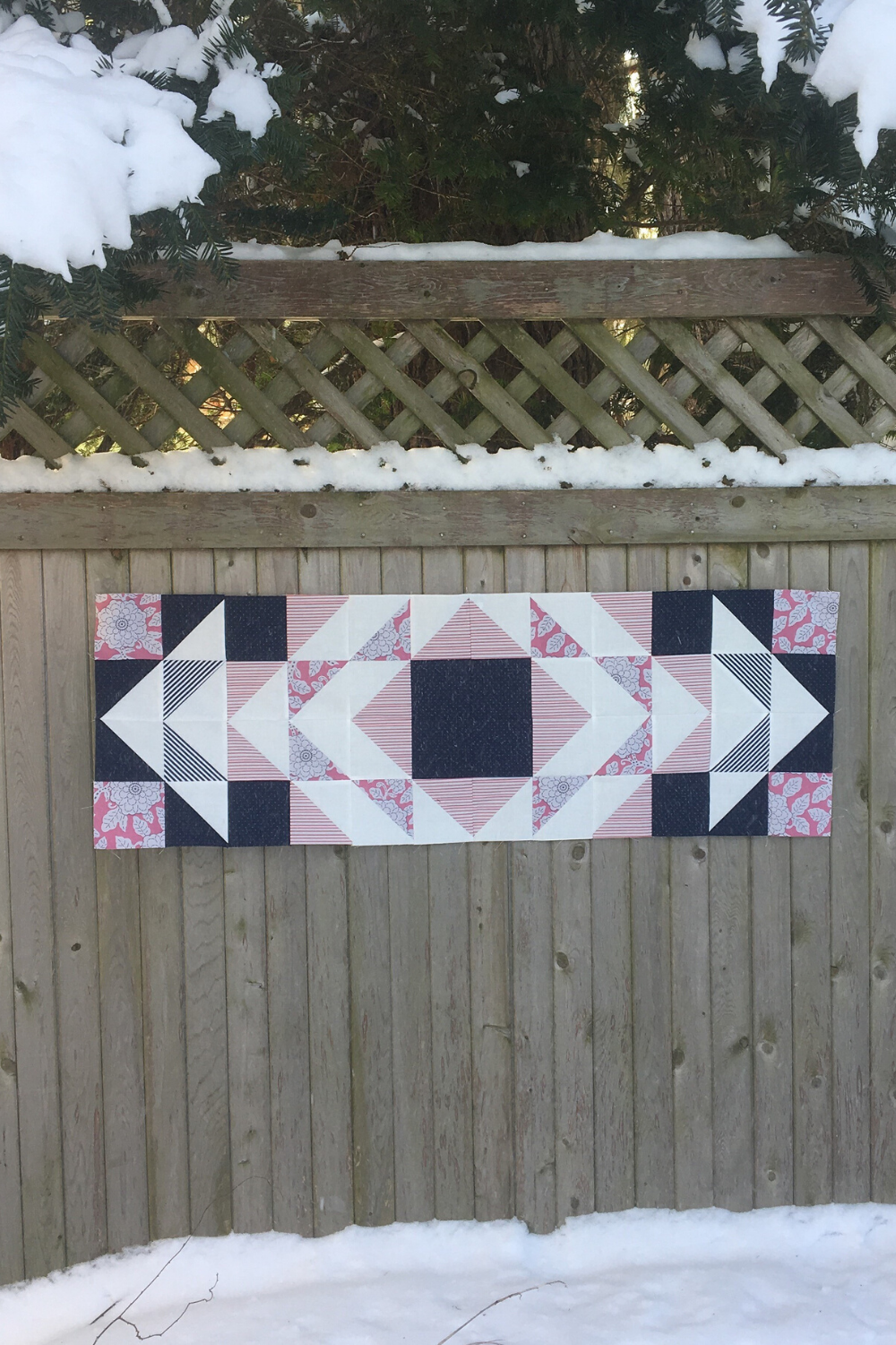 Navy, pink, light pink and white Modern Aztec quilted table runner top featuring 5-colors | choose from a 5-color or 10-color options in 2 sizes | Modern quilt pattern | Shannon Fraser Designs #quiltedtablerunner