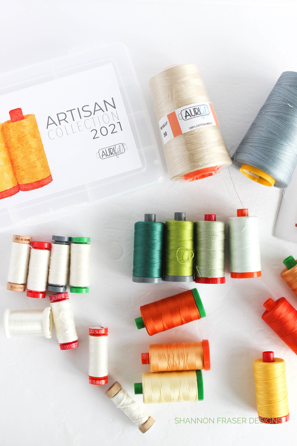 Different sizes of Aurifil Thread spools included in the Aurifil Artisan Collection 2021 | Shannon Fraser Designs #sewingnotions
