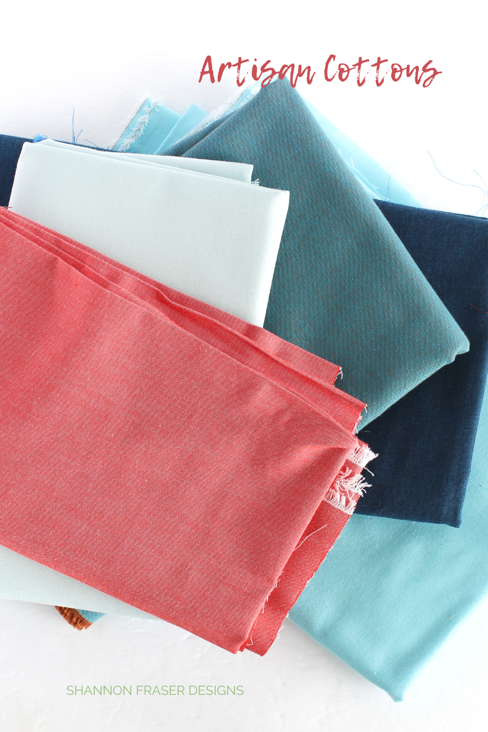 Artisan Cotton solids in shades of blue with a pop of coral featured in the Shattered Star quilt the Artisan Cotton version | Shattered Star quilt pattern | Shannon Fraser Designs #fabric