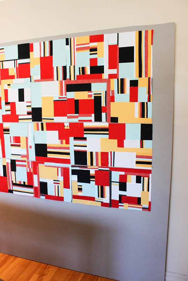 Mondrian improv quilt top hanging on my DIY design wall | Tutorial | Shannon Fraser Designs