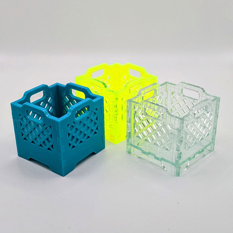 https://cdn.shopify.com/s/files/1/0017/2231/8946/products/Stackable-Mini-Milk-Crate-2-square_900x.jpg?v=1662660265