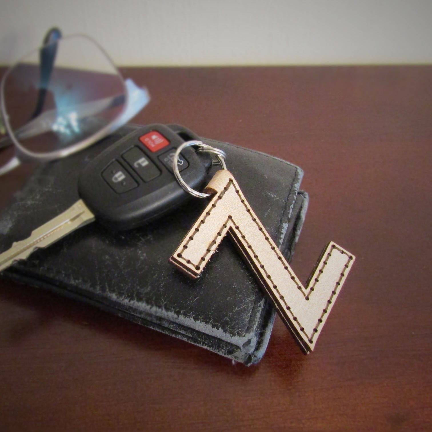 Download Stitched Leather Initial Keychains Set | Glowforge