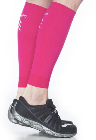 side photo of person wearing hot pink compression sleeves and black tennis shoes