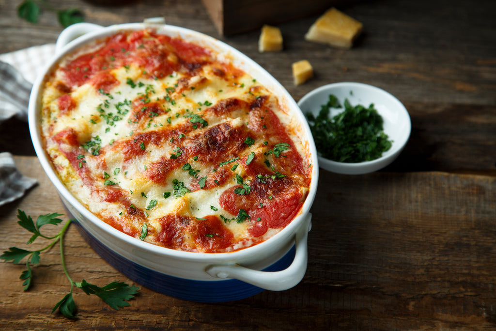 To get a browned top of a gratin you can use the top rack in the oven.