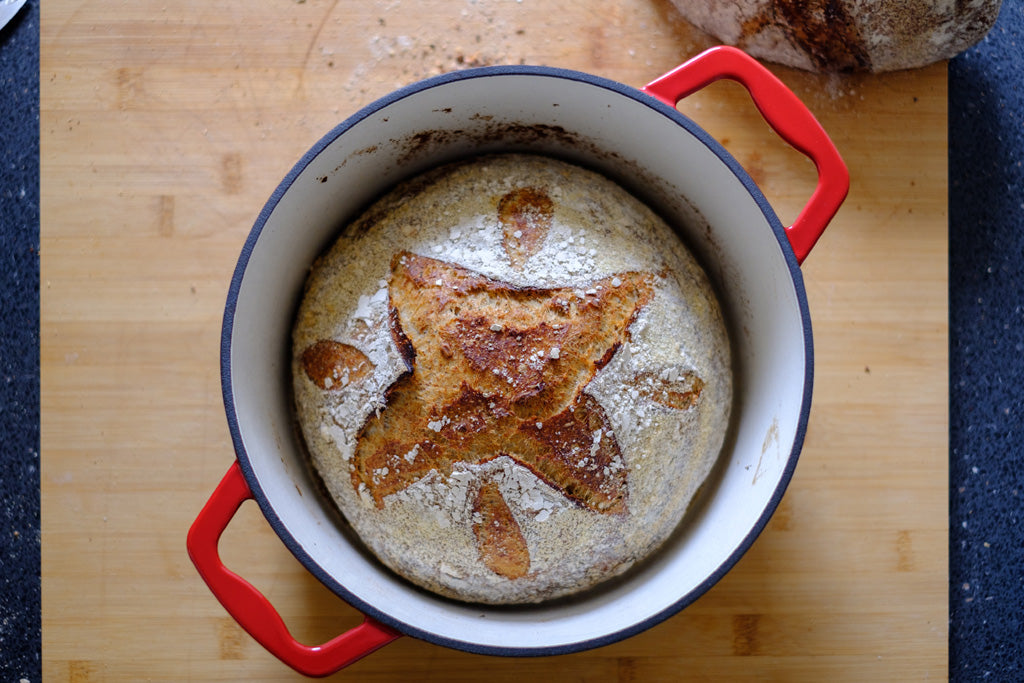 artisan bread in an enameled cast iron dutch oven