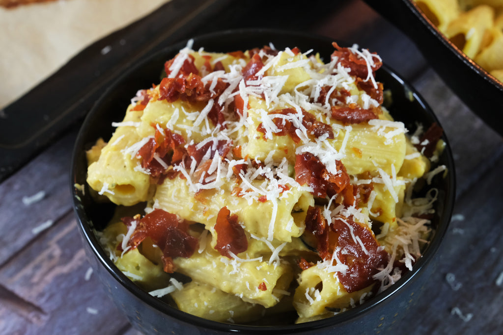 Creamy Roasted Butternut Squash Pasta topped with crispy prosciutto