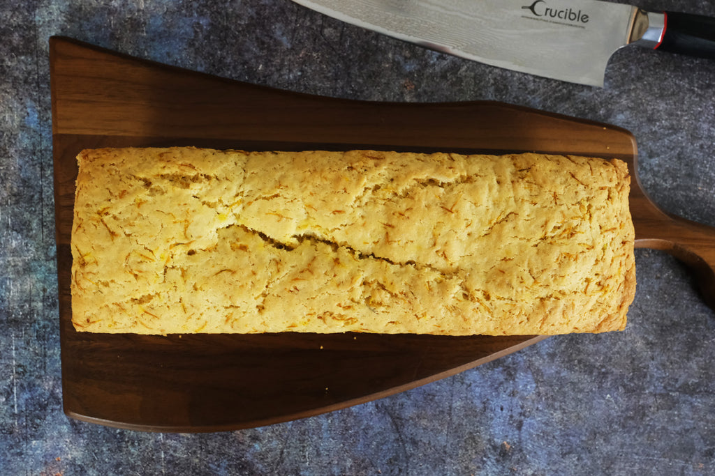 Dandelion cake on a cutting board