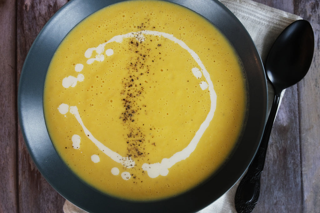 butternut squash soup with freshly cracked black pepper