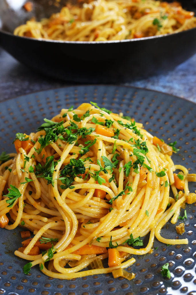 soffritto pasta topped with parsley