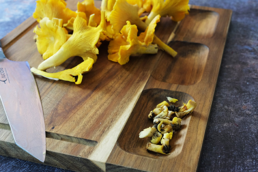 chantarelles on a cutting board