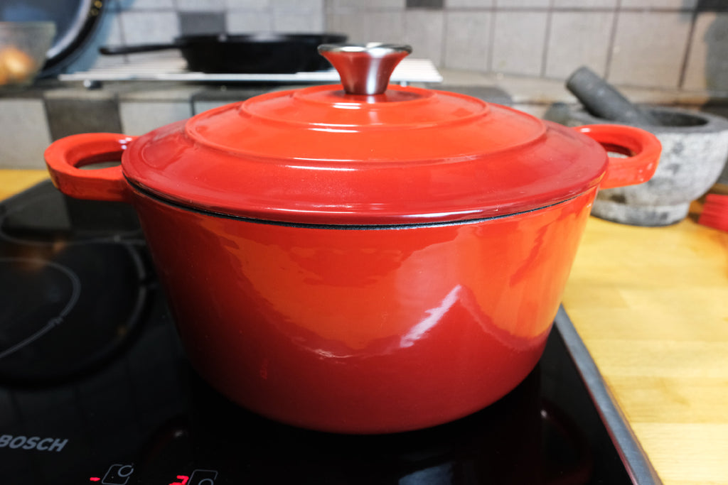 Crucible Cookware enameled cast iron dutch oven on the stove