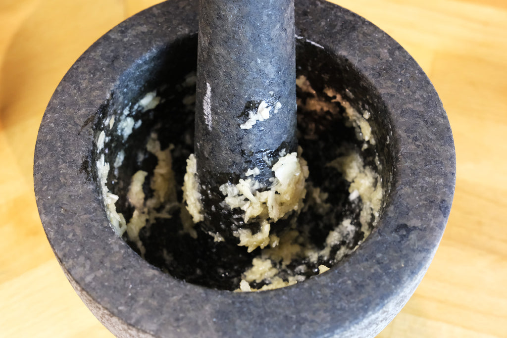 garlic paste in a mortar