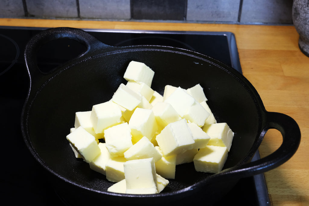 butter for ghee in a cast iron balti dish