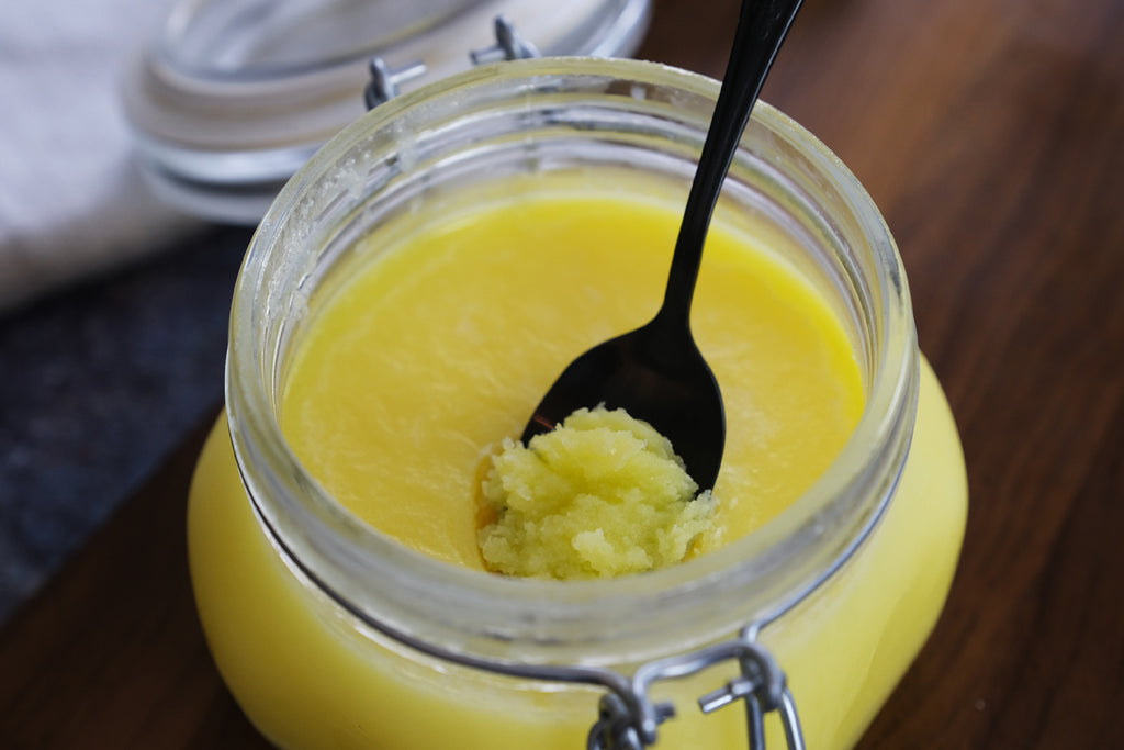 solid ghee in a glass jar