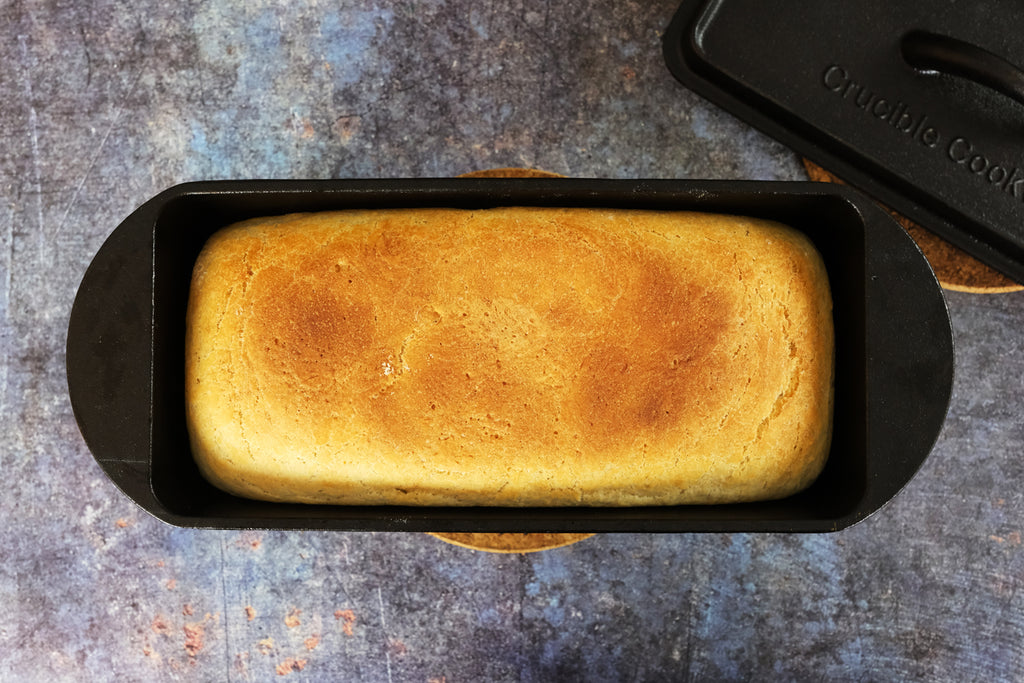 homemade bread in a cast iron loaf pan