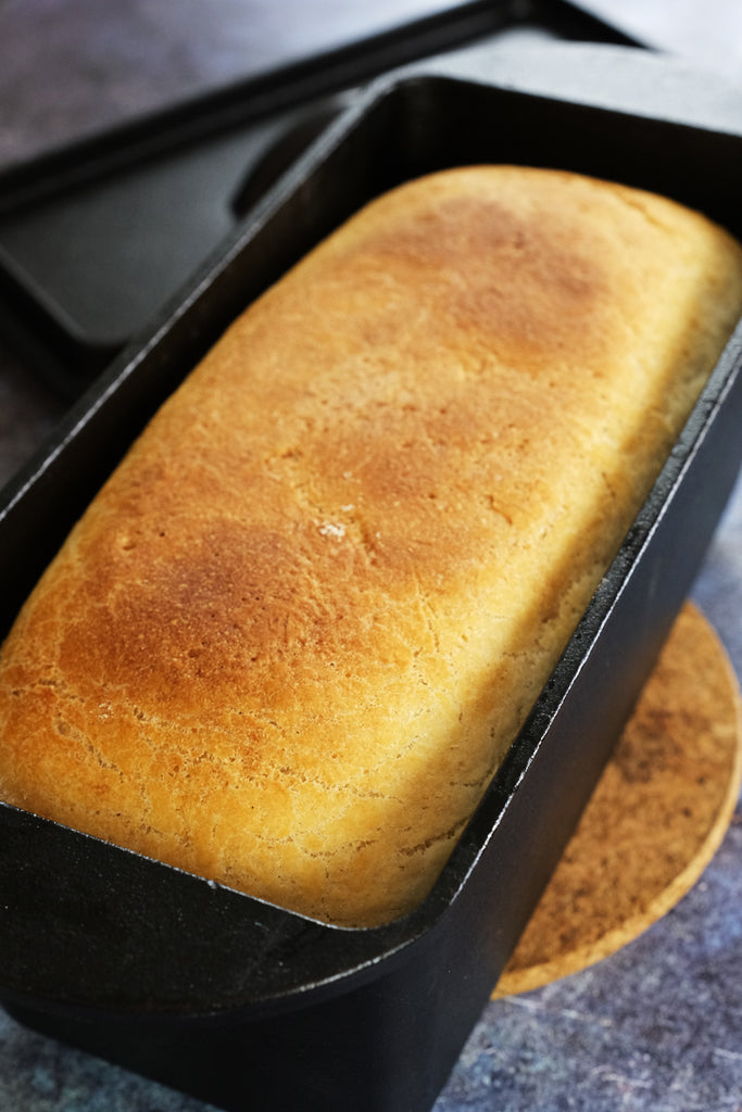 homemade bread in a cast iron loaf pan