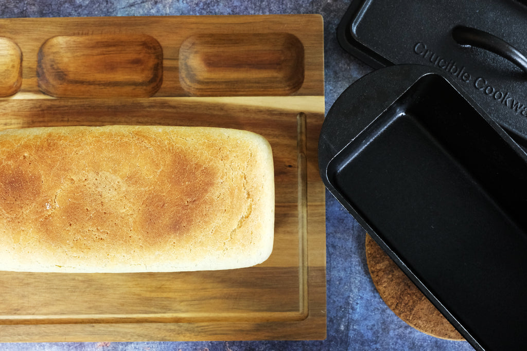 freshly baked bread on a wooden cutting board