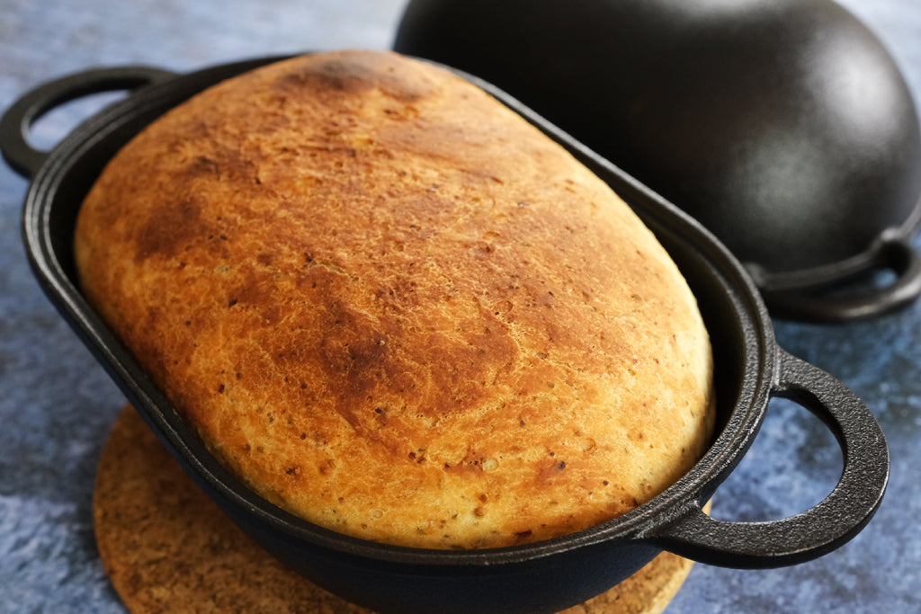 artisan bread in a cast iron bread pan