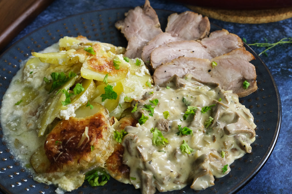 Pork Sirloin, Potato and Leek Gratin with Creamy Chanterelle Sauce Served