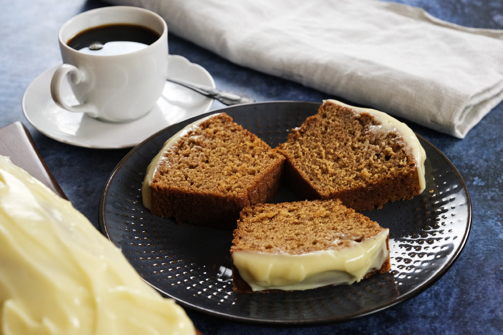 spice cake with cream cheese frosting served with coffee