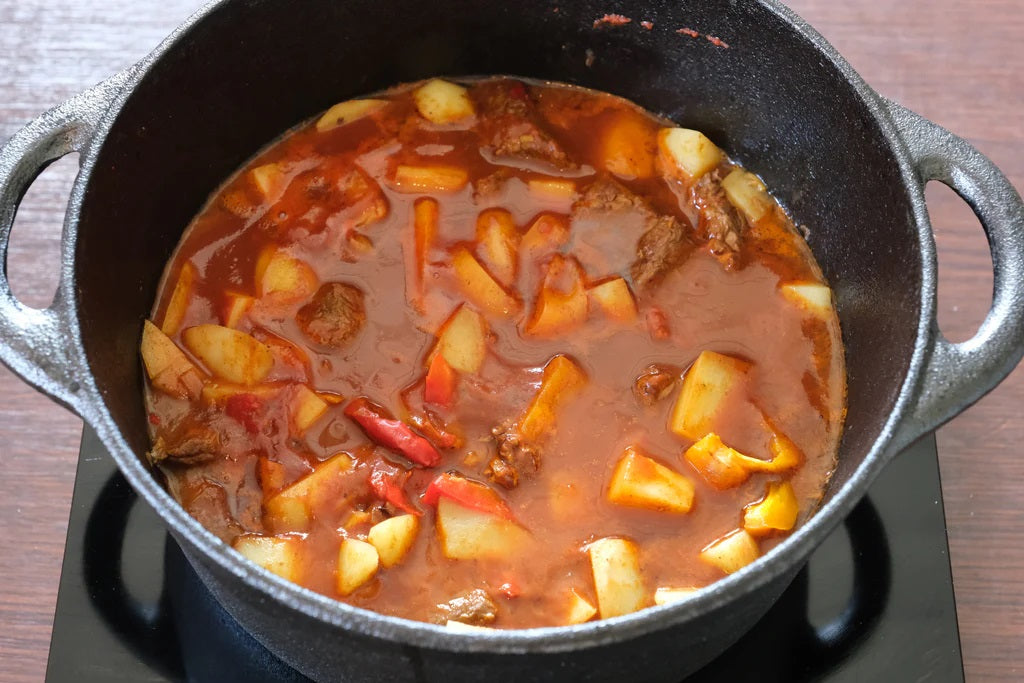 gulasch in a cast iron dutch oven