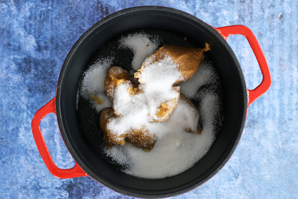 peanut butter, syrup and sugar in an enameled cast iron dutch oven