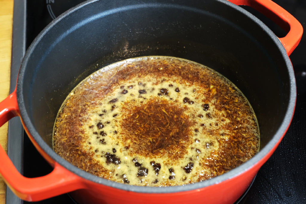 meat glaze in an enameled cast iron dutch oven