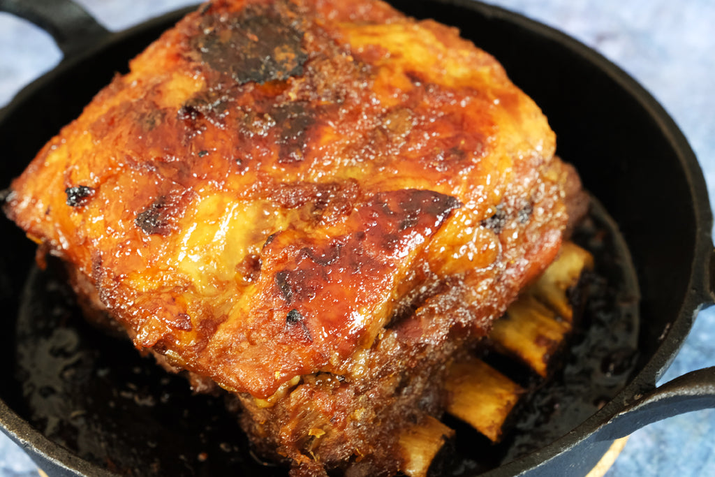 pork ribs in a cast iron oven pan