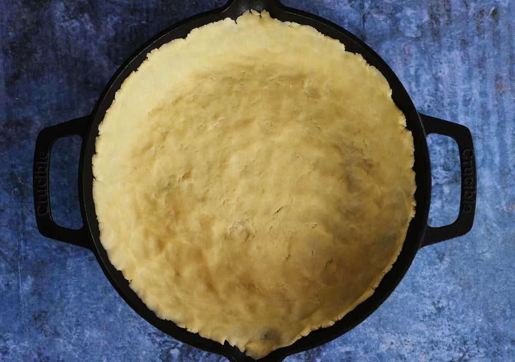 pie dough in a cast iron skillet