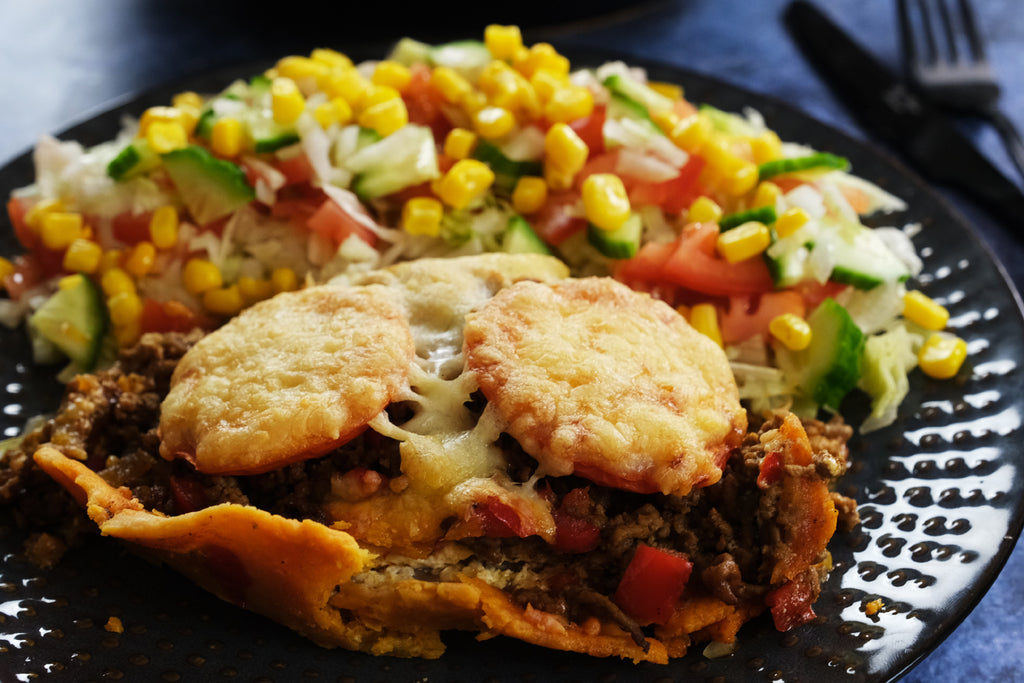 taco pie served with a salad