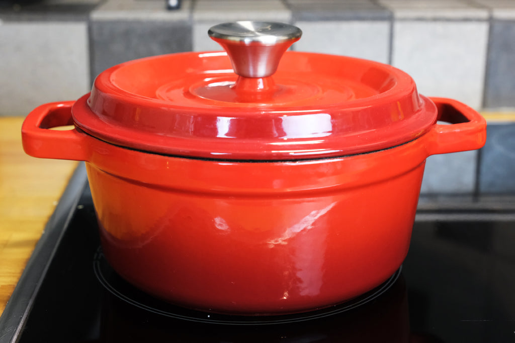 crucible cookware enameled cast iron dutch oven on the stove