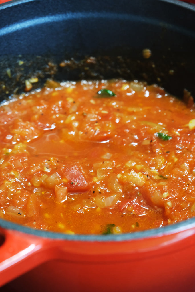 marinara sauce in an enameled cast iron dutch oven