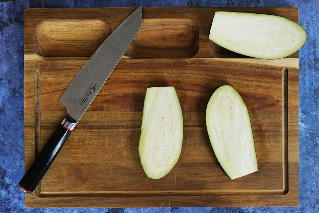 eggplant on a wooden cutting board