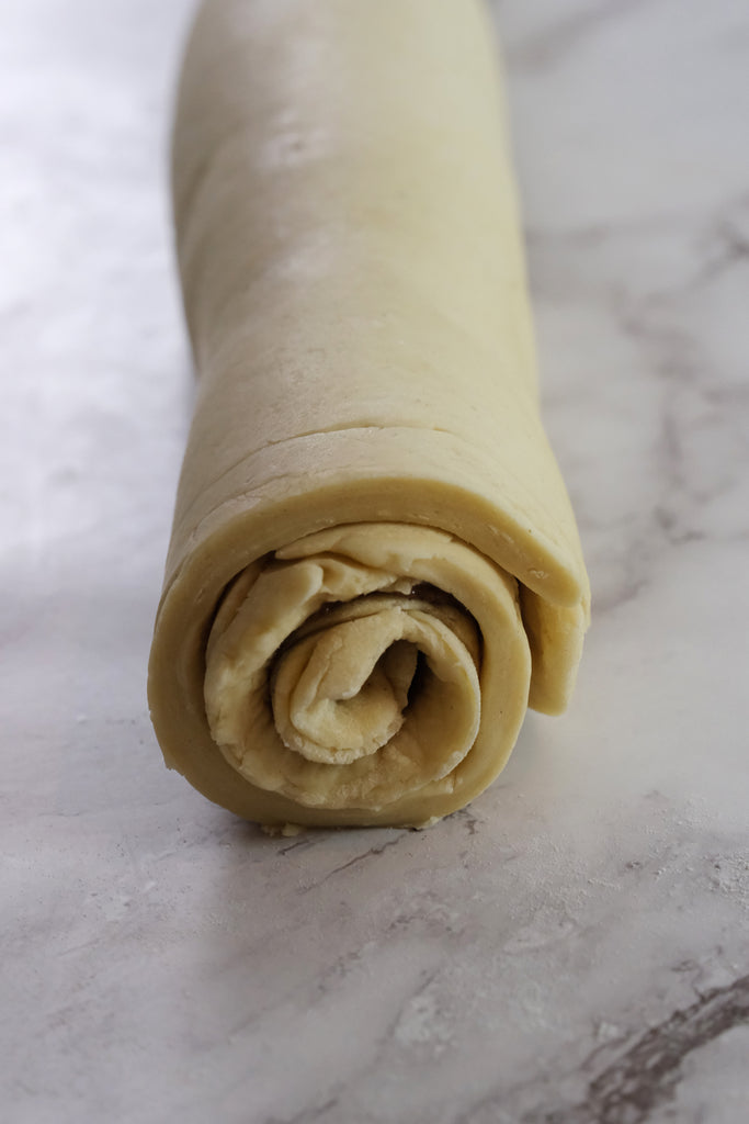 the dough in a roll