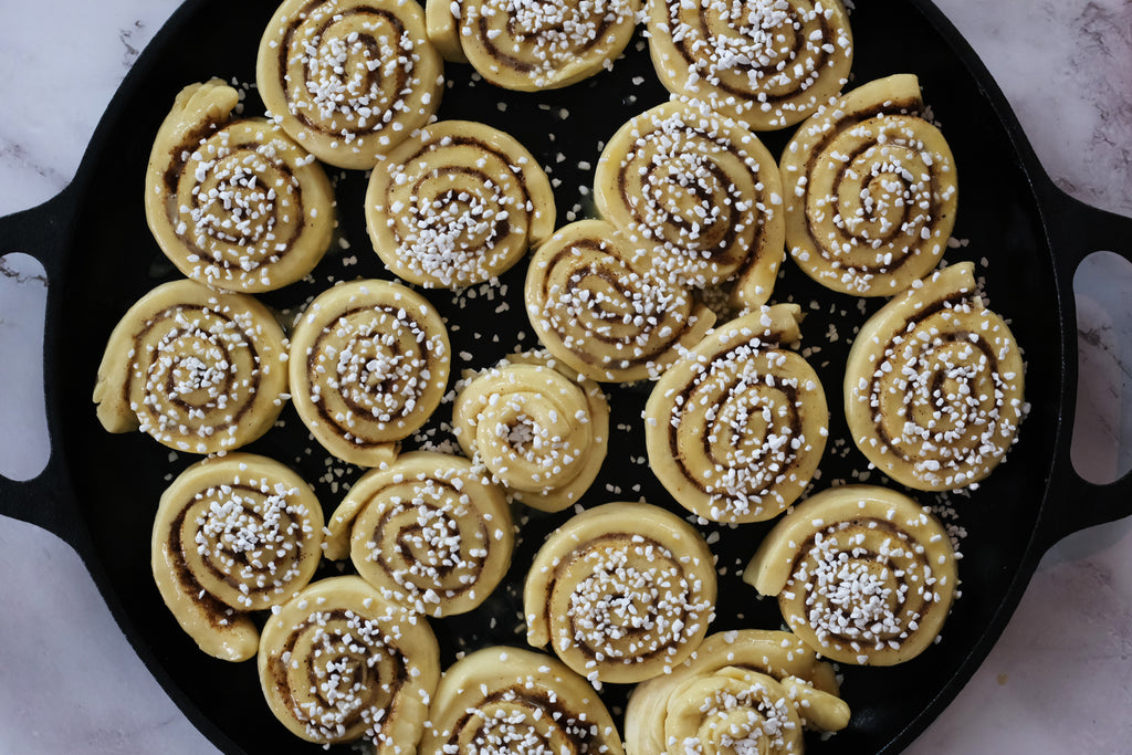 cinnamon rolls topped with pearl sugar