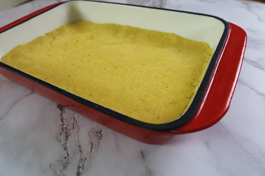 polenta in a enameled cast iron roasting pan