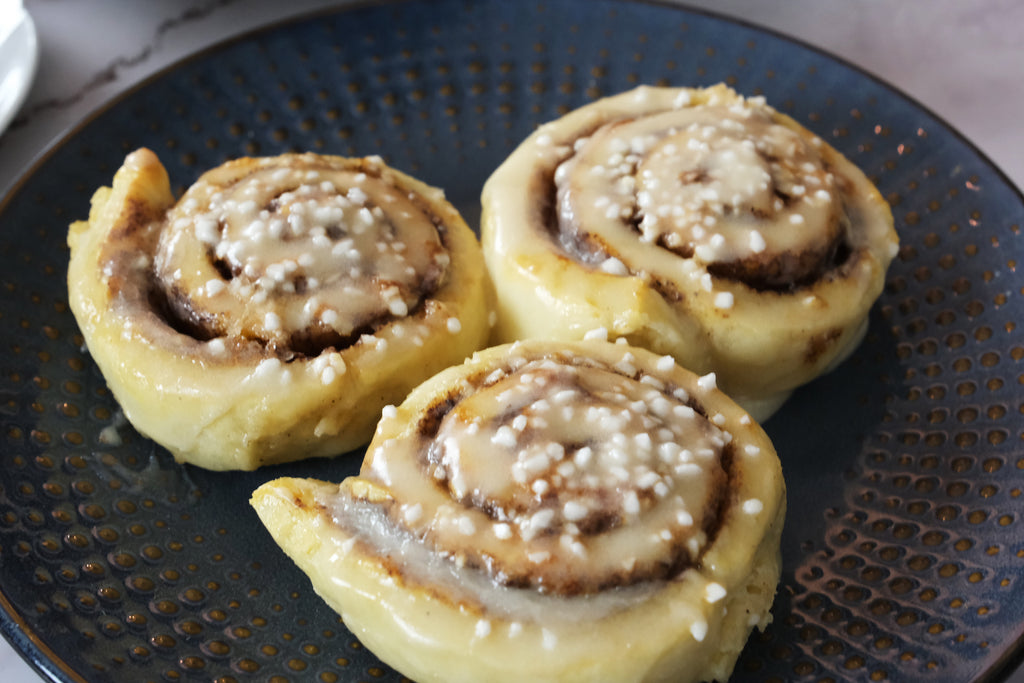 cinnamon rolls served on a plate