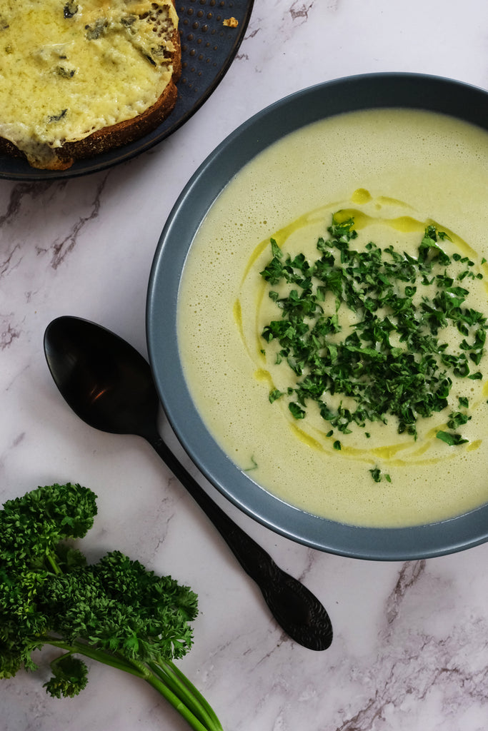 broccoli soup served with blue cheese bread